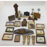 A collection of miniature dolls house items including camel lamps, brass fender, "taxidermy",