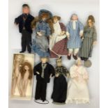 A collection of dolls house figures