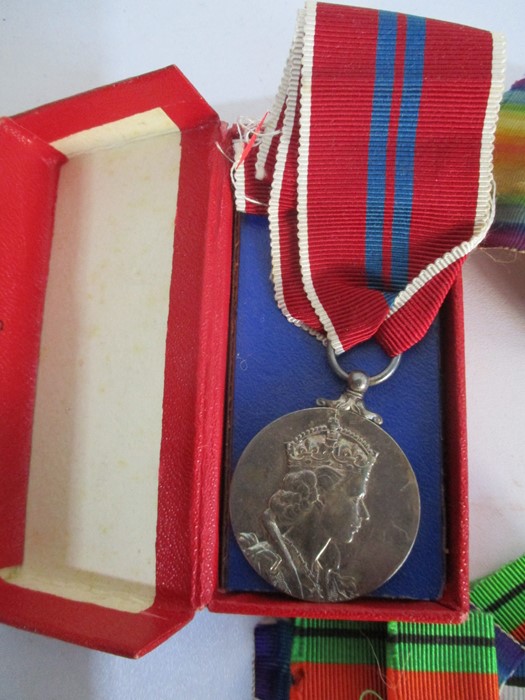 A collection of various medals including three WWI medals, ( awarded to F 15557, A.L.Warren, AM2 - Image 9 of 12