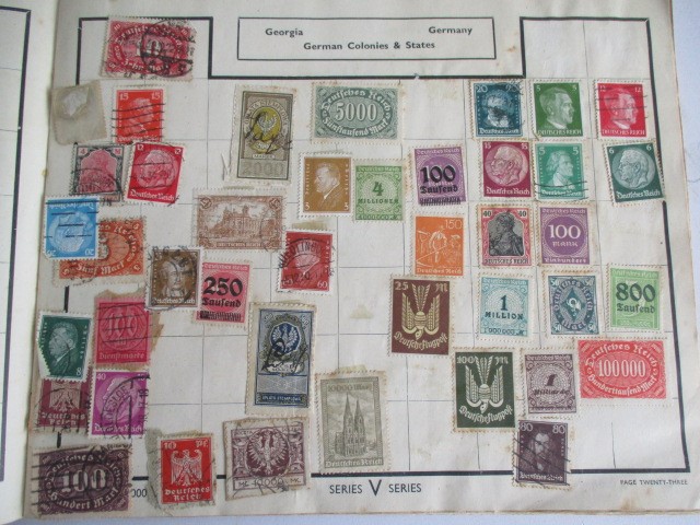 Two albums of various worldwide stamps along with an empty album - Image 53 of 55