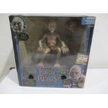 A new in sealed box Lord of the Rings ( Return of the King) electronic talking Gollum with