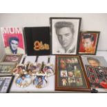 A collection of Elvis Presley memorabilia and guitar shaped plates A/F