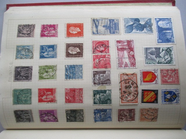 Two albums of various worldwide stamps along with an empty album - Image 32 of 55