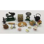 A collection of dolls house items including vintage style kitchenalia (scales, kettle, mincer etc)