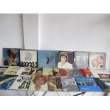 A collection of various LP's including Queen,Rod Stewart etc.