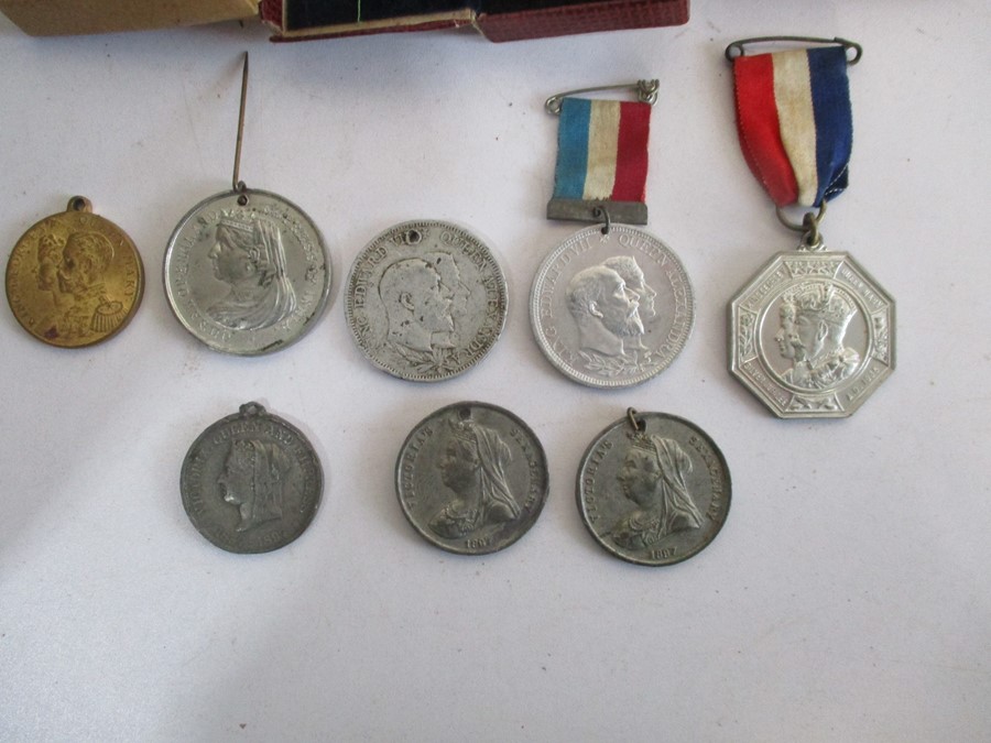 A collection of various medals including three WWI medals, ( awarded to F 15557, A.L.Warren, AM2 - Image 2 of 12