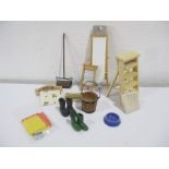 A collection of miniature dolls house kitchen items including ironing board,step ladder, carpet