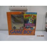 A boxed Nintendo Game Boy with Tetris and Mario & Yoshi