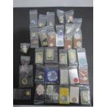 A collection of miniature dolls house items including crochet work, china etc.