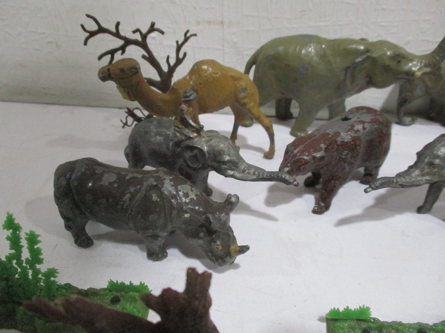 A collection of Britains lead animals including Indian elephants, rhinoceros along with Britains - Image 3 of 12