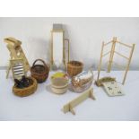 A collection of miniature dolls house kitchen items including wicker, ironing board, step ladder