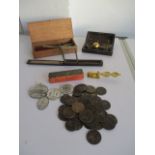 A collection of items including sovereign scale, coins, pocket scales etc