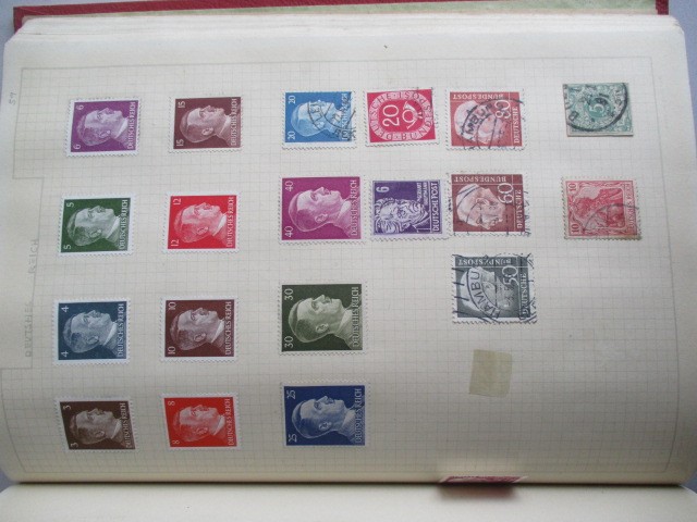 Two albums of various worldwide stamps along with an empty album - Image 35 of 55