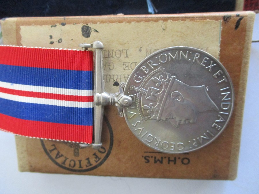 A collection of various medals including three WWI medals, ( awarded to F 15557, A.L.Warren, AM2 - Image 5 of 12