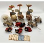 A collection of Heidi Ott miniature "ladybird" dolls, babies in shell prams "Better Late than Never"