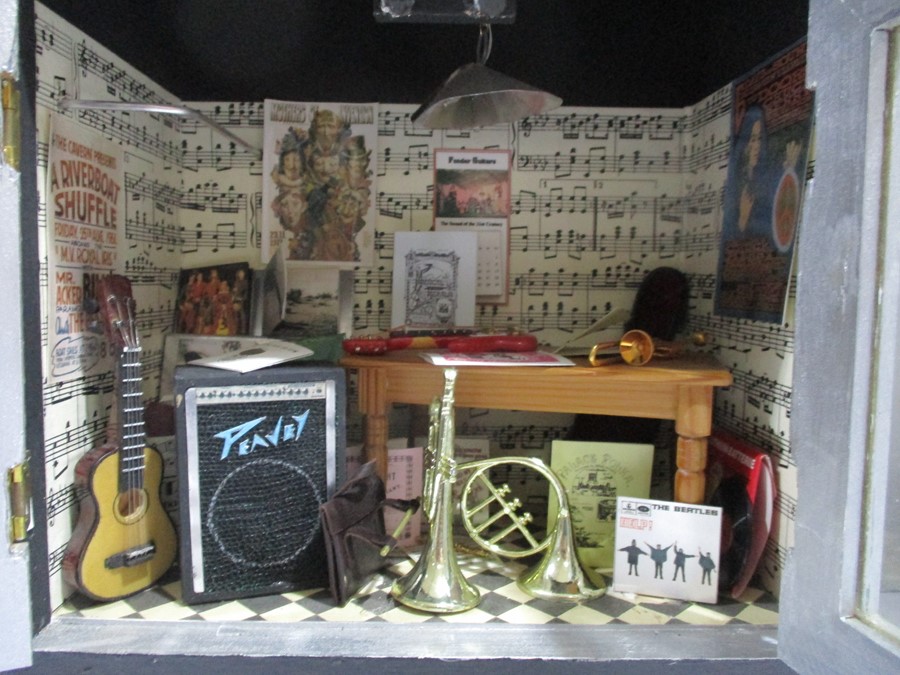 A diorama "Theo's" music shop with wooden building with musical instruments, records, sheet music - Image 3 of 12