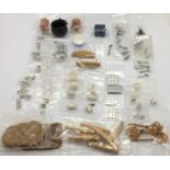 A collection of miniature dolls house items- kitchen related, including bread bin, cauldron, keys,