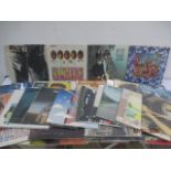 A good collection of 50 vinyl records including Rolling Stones, Beatles, Pink Floyd, Thin Lizzy, The