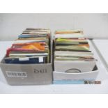 A collection of various 7" singles including Status Quo etc - in 2 boxes