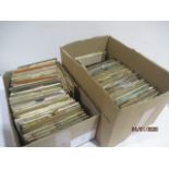 A collection of various 7" singles including The Beatles, The Searchers, Cliff Richard, Elvis