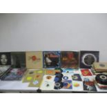 A good collection of records and singles including The Rolling Stones, Dusty Springfield, Gensis,