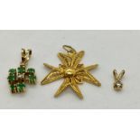 An 18ct filigree gold Maltese cross pendant ( 1.6g) along with a 14ct gold and diamond pendant and
