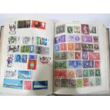 A collection of worldwide stamps along with loose stamps