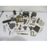 A collection of miscellaneous small items including brass ware, scent bottle, vintage whistles,