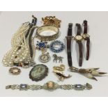 A collection of costume jewellery including a hallmarked silver bracelet etc