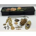 A collection of Victorian brooches etc. including 9 ct gold, otter paw brooch in a lacquered glove