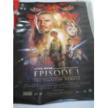 A Star Wars Episode 1 film poster along with a Star Wars Battlefront poster