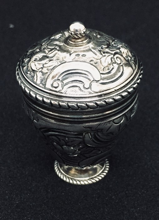 A silver nutmeg holder by David Field, circa 1740 with rococo decoration