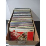 A collection of vinyl records including Cliff Richard, James Last, Roy Orbison, Bee Gees, Chris De