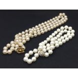 Two strings of Chanel oversized faux pearls