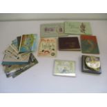 A collection of postcards, cigarette cards etc