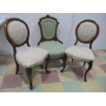 A pair of Edwardian bedroom chairs on cabriole legs along with a nursing chair