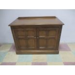 A small Ercol Golden Dawn sideboard