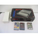 A Sinclair ZX81 with power pack, 16k RAM and three games