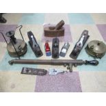 A collection of brass and metalware etc. including various planes, brass sprayer etc.