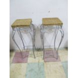 A pair of wrought iron and rattan stools