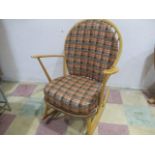 An Ercol rocking chair (cushions to be removed after sale due to fire safety regulations)