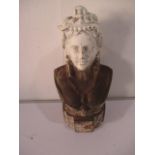 A Victorian cast iron bust of a lady