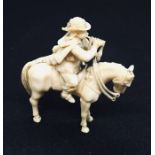 A 19th century carved ivory miniature of a cavalier on horse back- 1 leg A/F