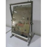 A chrome Art Deco toilet mirror by Metlex