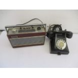 A bakelite GPO dial telephone along with a vintage Roberts radio