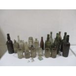 A collection of vintage bottles and jars