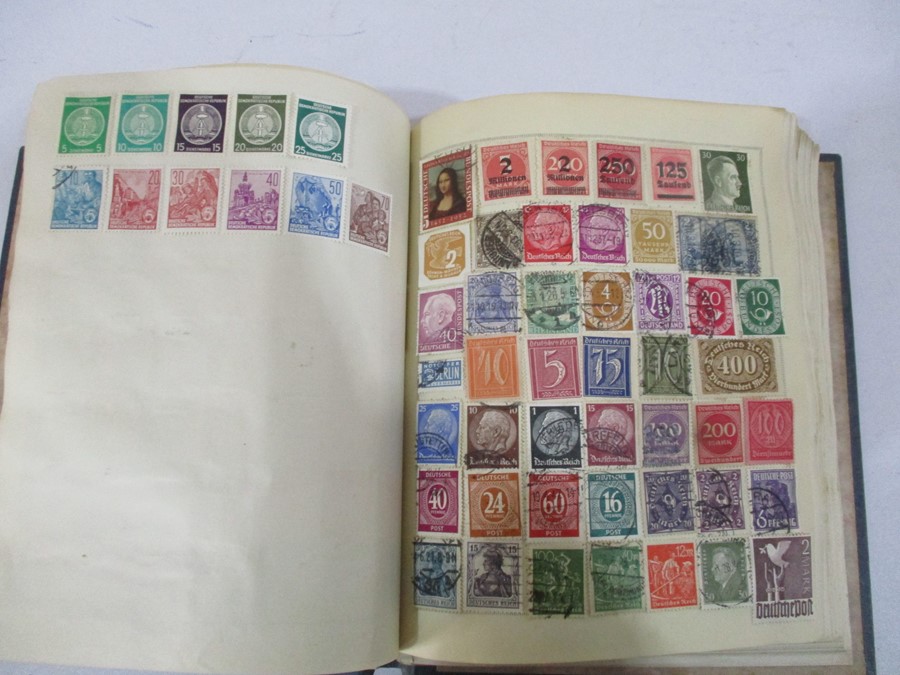 A collection of worldwide stamps along with loose stamps - Image 36 of 94