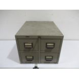 A metal industrial style set of four drawers