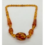 An amber necklace, 90g