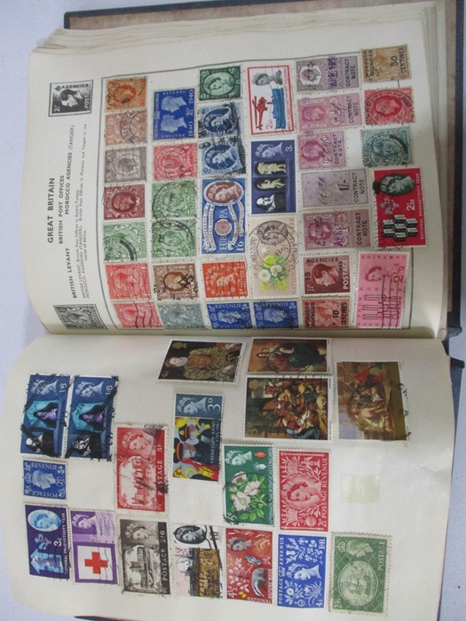 A collection of worldwide stamps along with loose stamps - Image 40 of 94